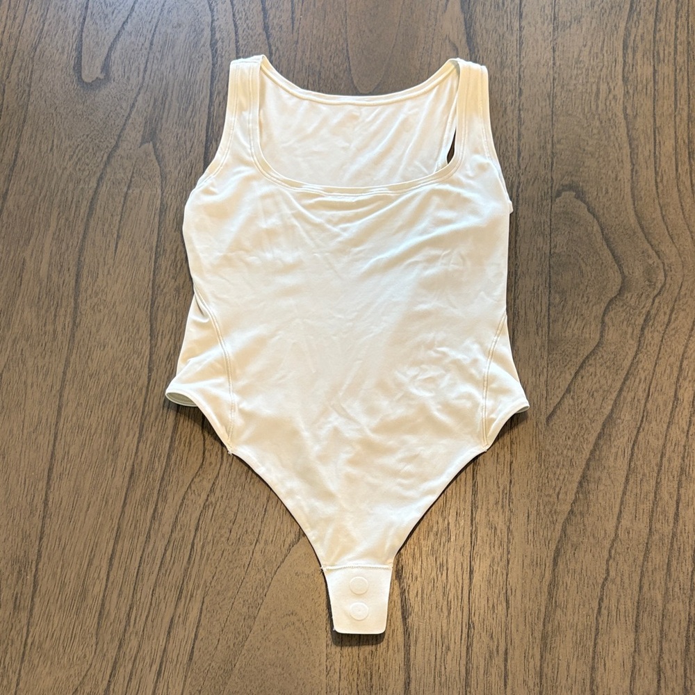 Lululemon Athletica Cream Bodysuit